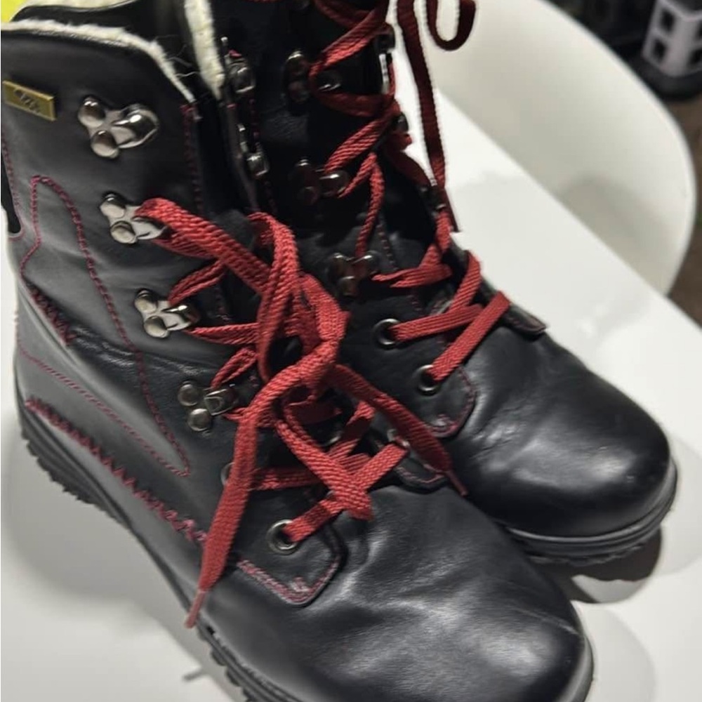 Chic Black Leather Boots with Red Accents